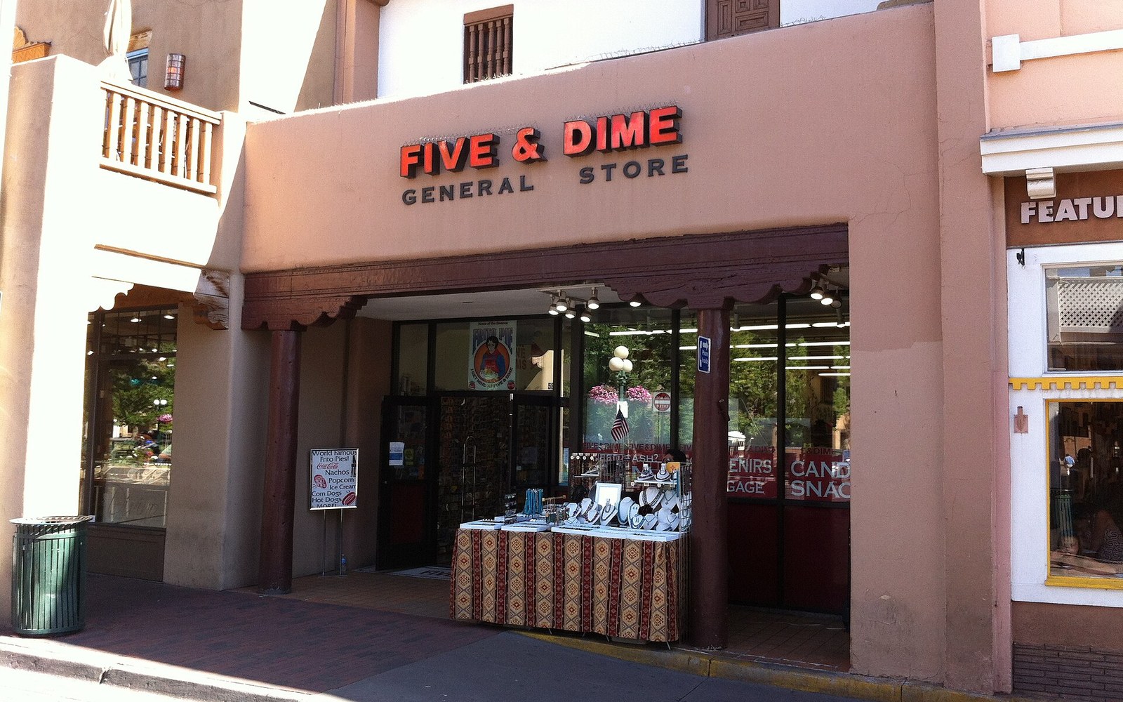 Storefront of the Five & Dime General Store with a jewelry display table outside its entrance